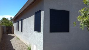 Sun screens install on west side of phoenix home